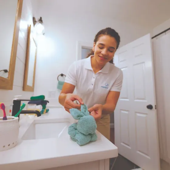 MaidPro cleaner adding a personal touch in a Des Moines home